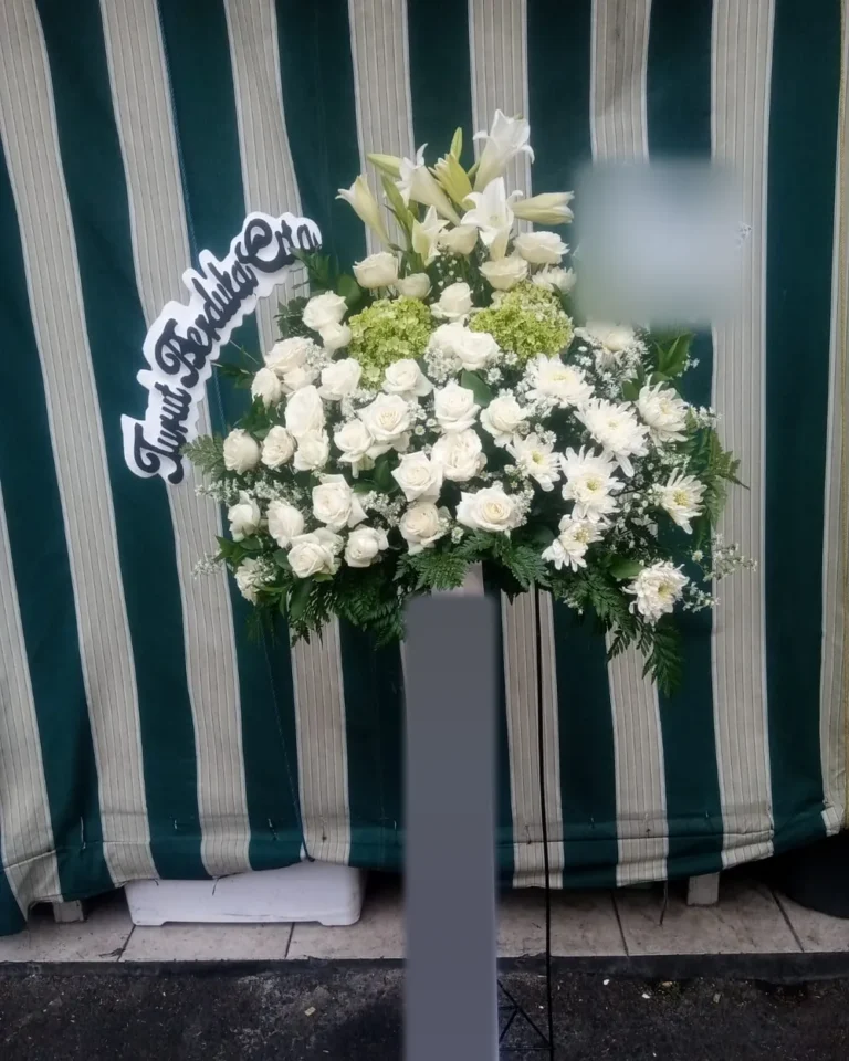 Standing flower duka cita putih dengan lily